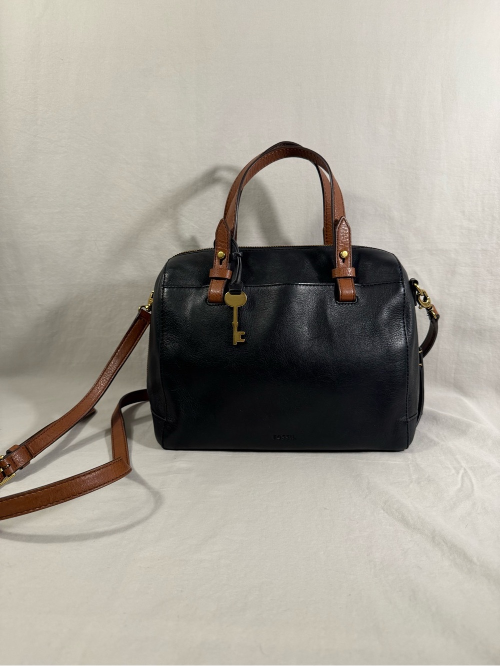 Fossil Black Leather Satchel with Brown Straps and Gold Key Charm